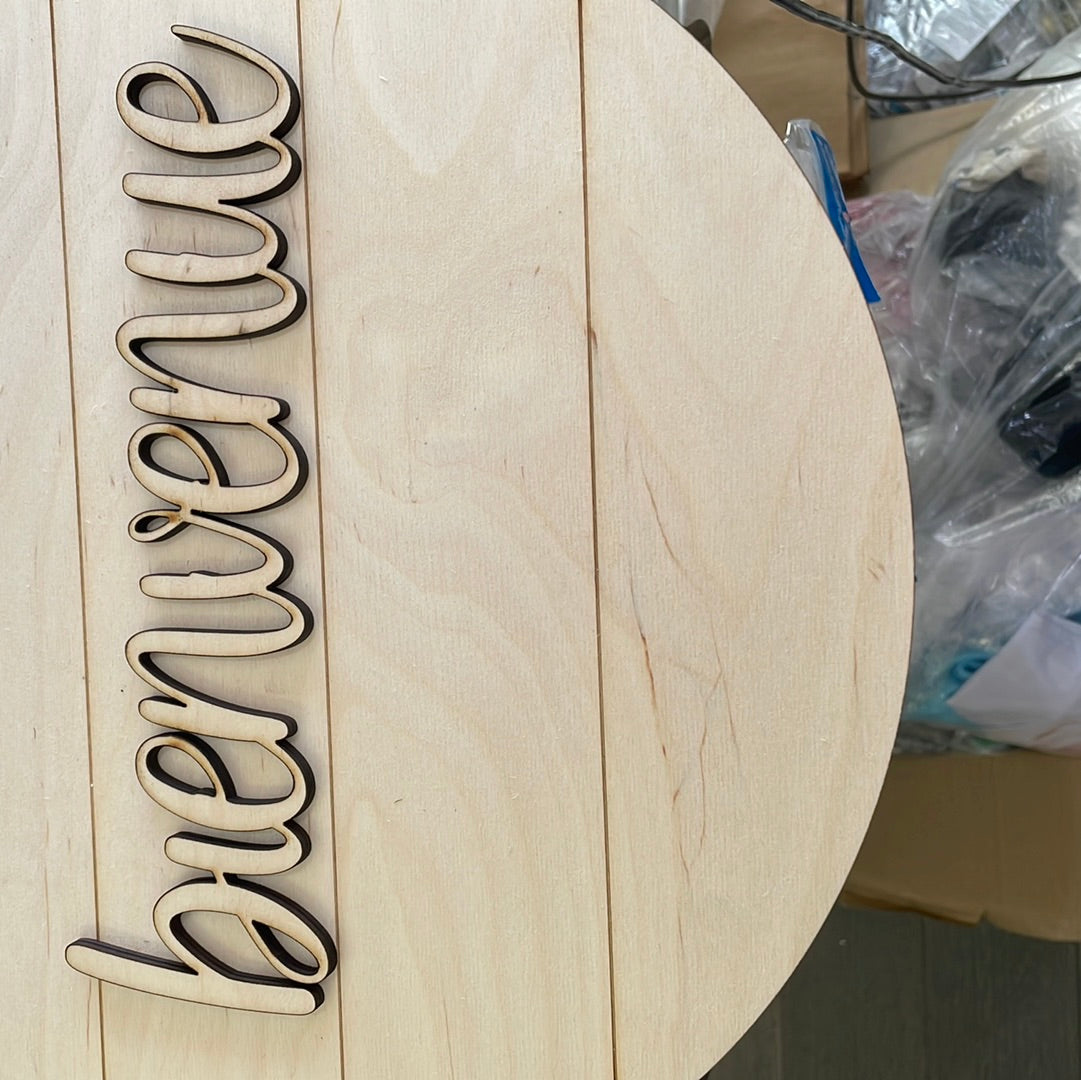 bienvenue wood cut